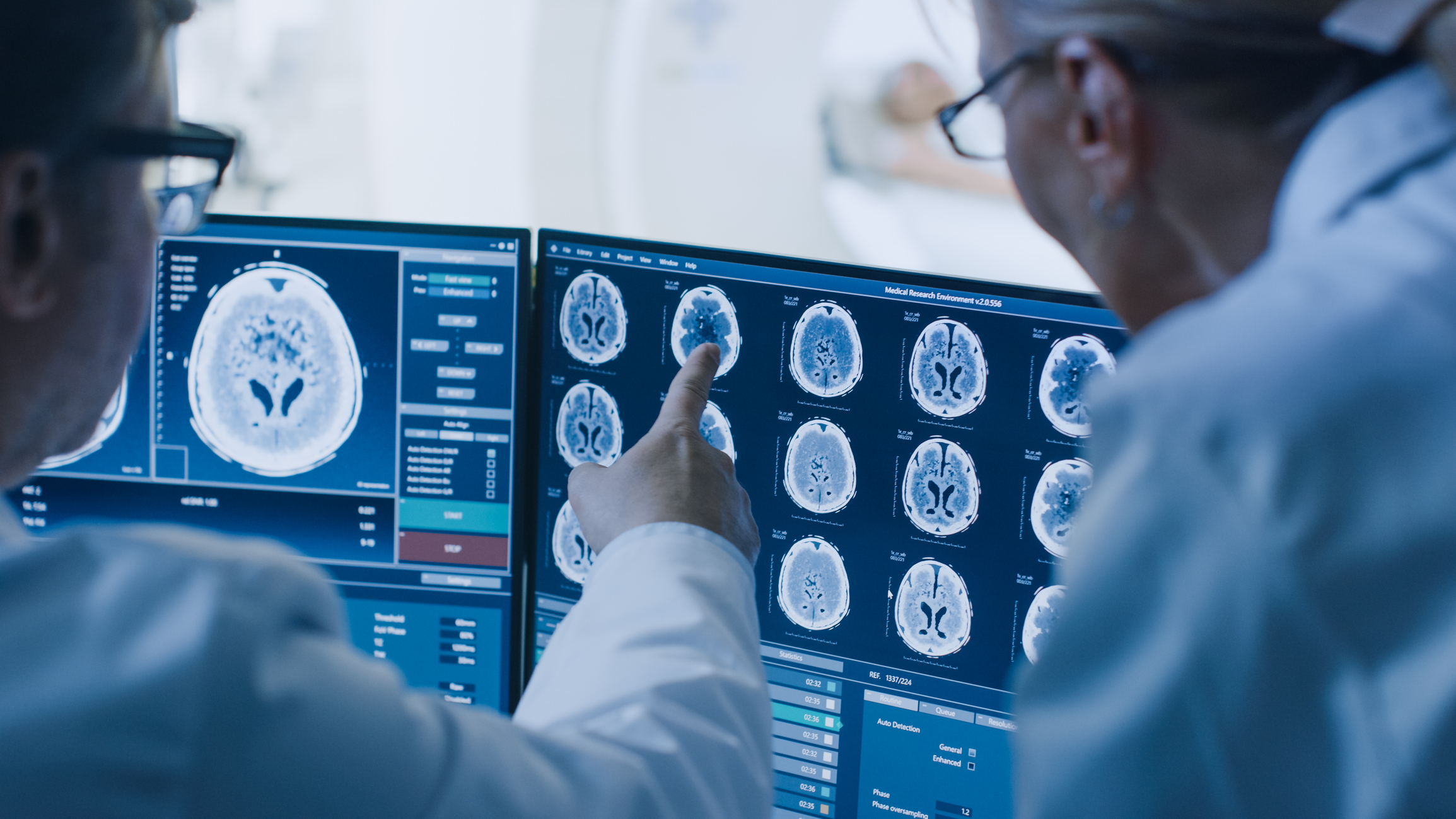 Clinicians reviewing medical imaging